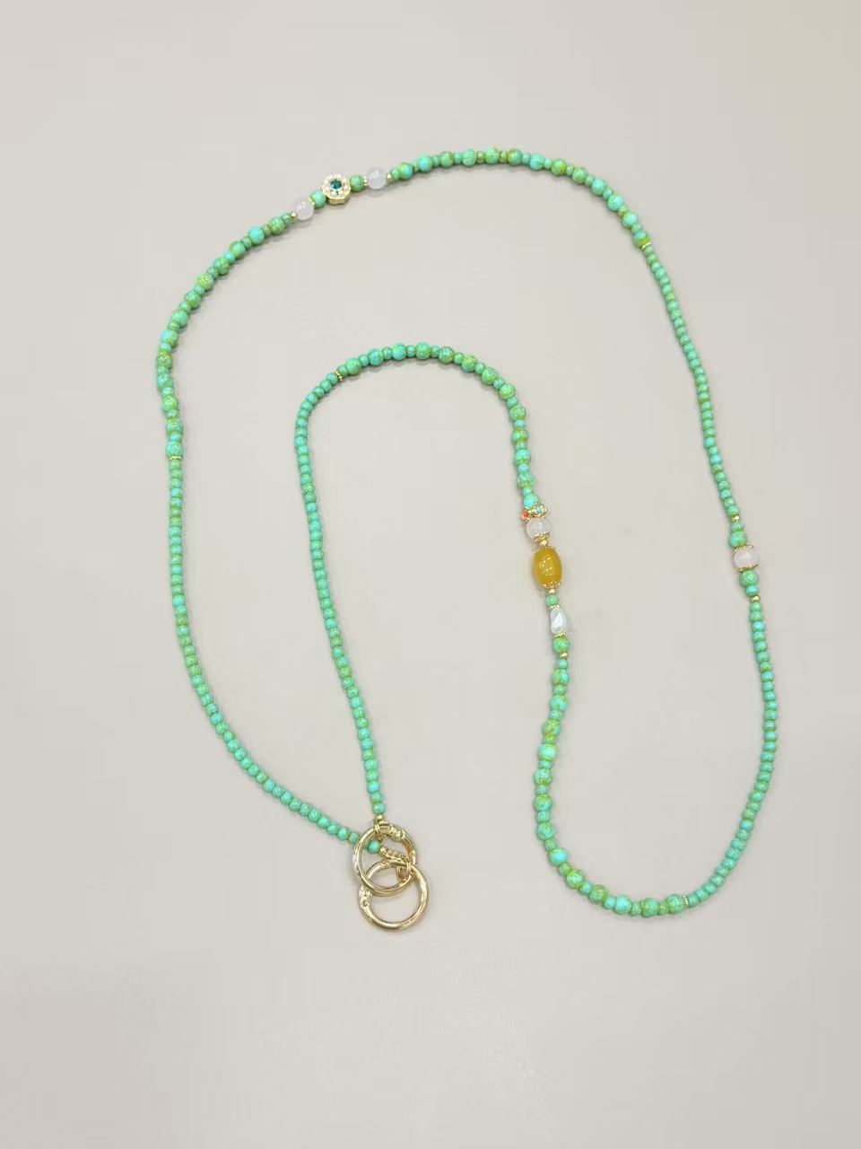Mint green beaded phone lanyard