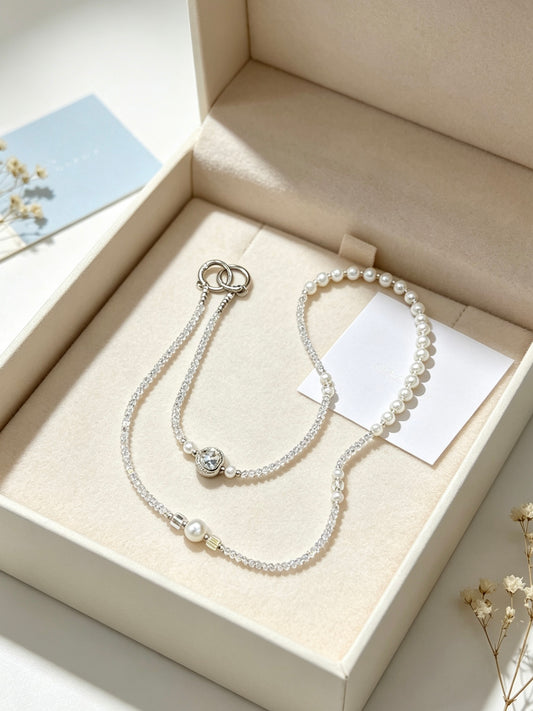 Crystal pearl phone lanyard with blue heart