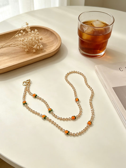 Champagne crystal phone lanyard with citrus