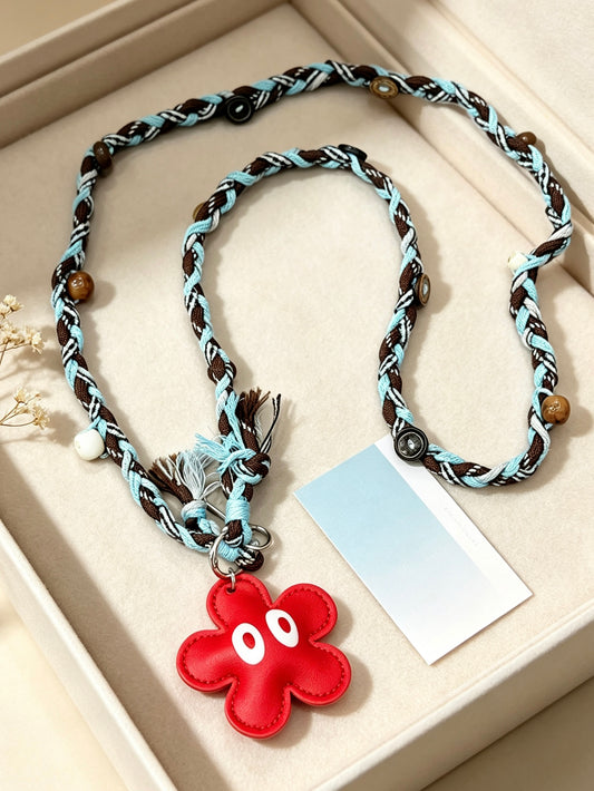 Brown blue braided phone lanyard with flower charm