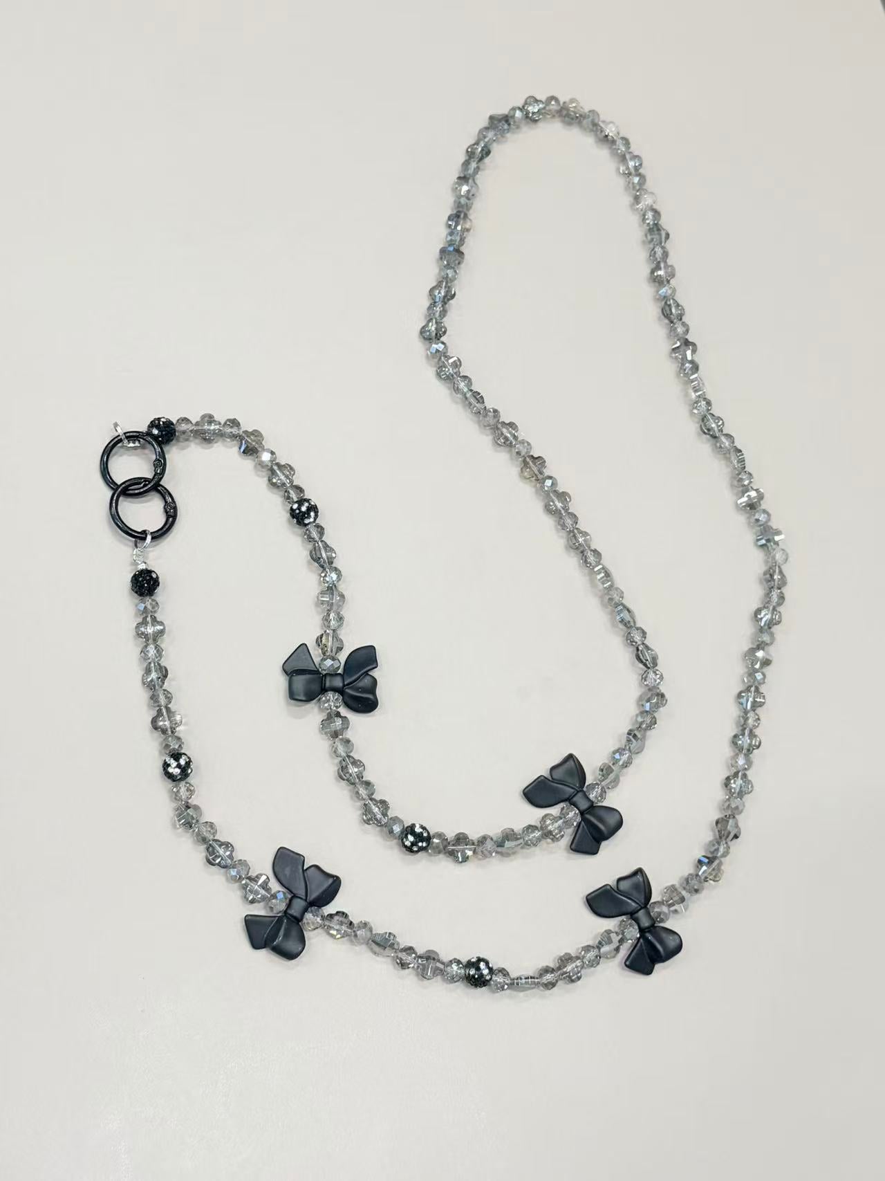Crystal phone lanyard with black bows