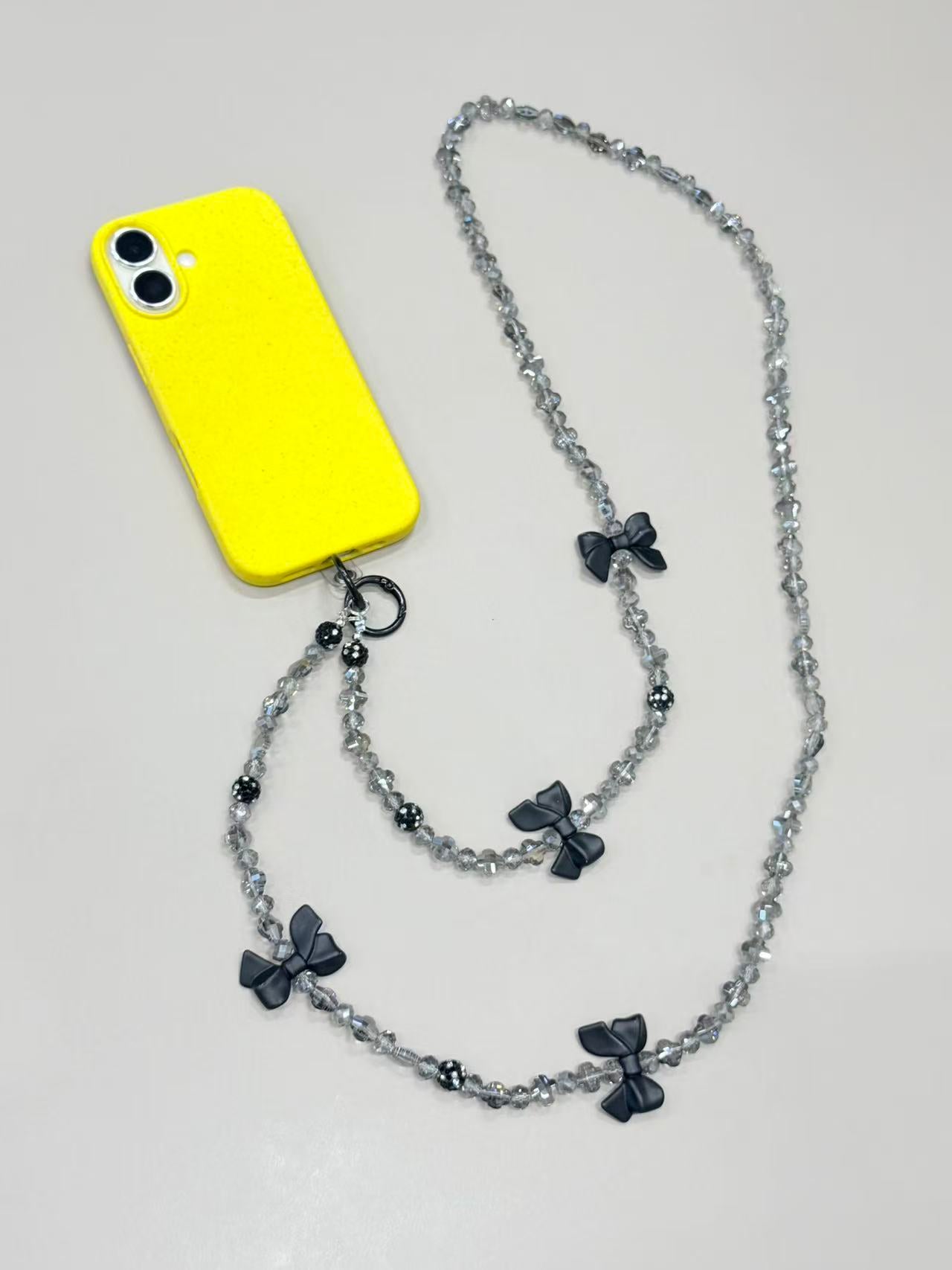Crystal phone lanyard with black bows