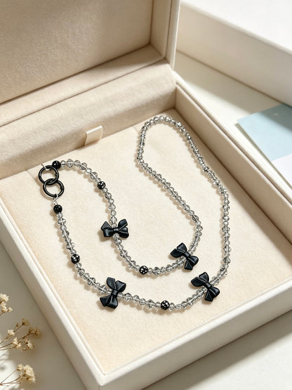 Crystal phone lanyard with black bows