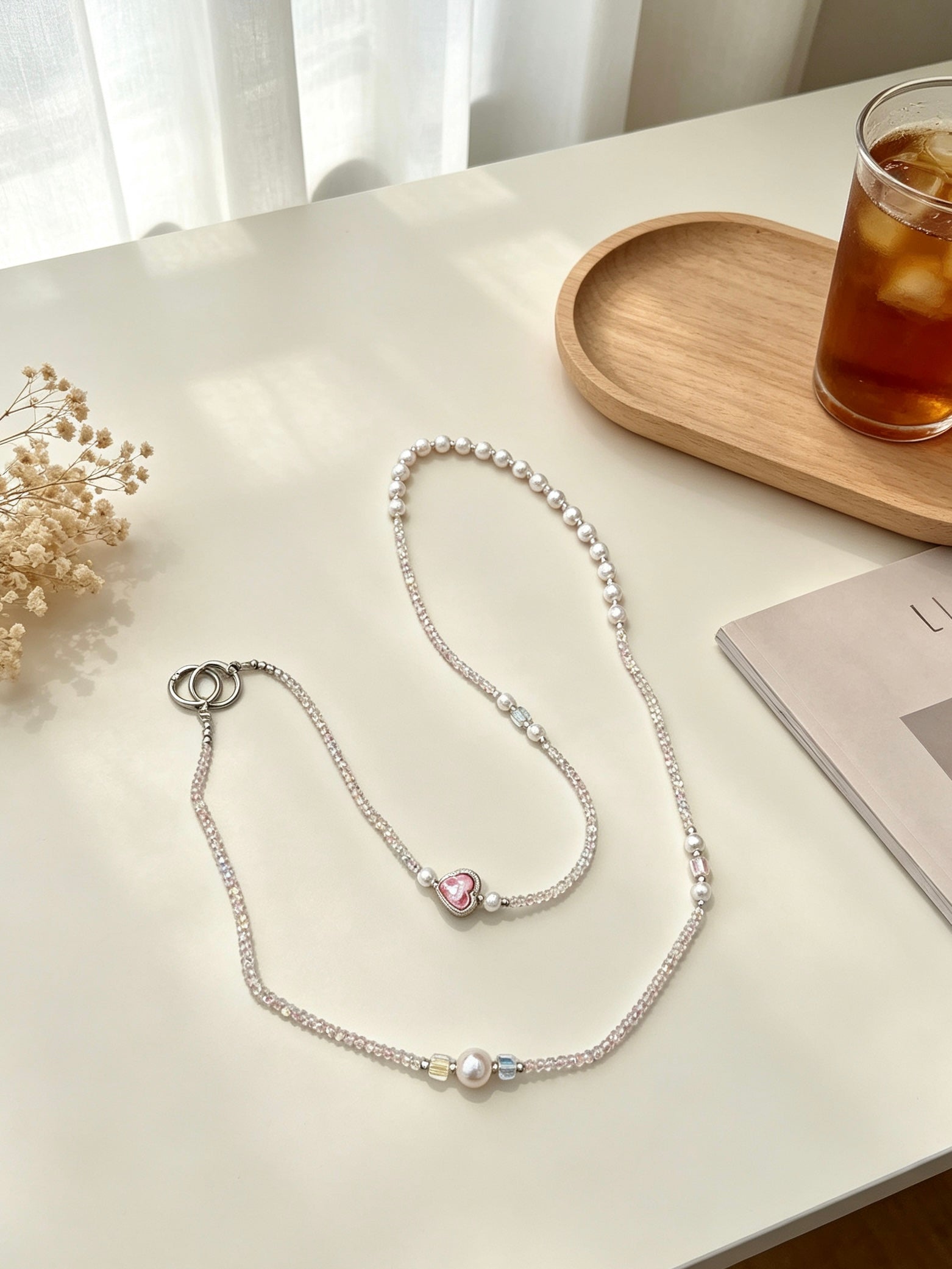 Pearl crystal phone lanyard with pink heart
