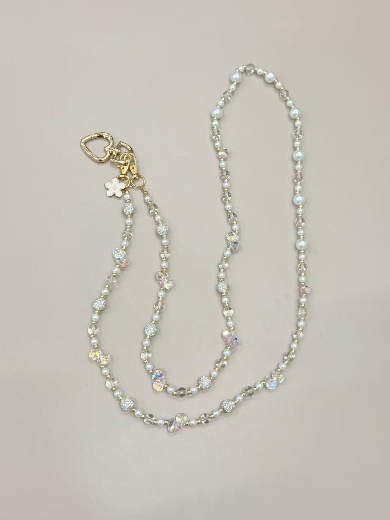 Pearl crystal phone lanyard with flower charm