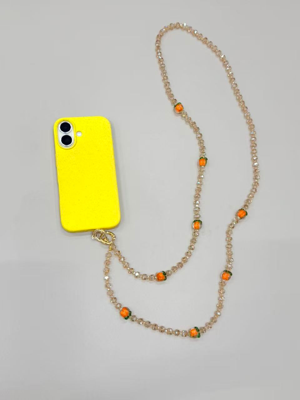 Champagne crystal phone lanyard with citrus