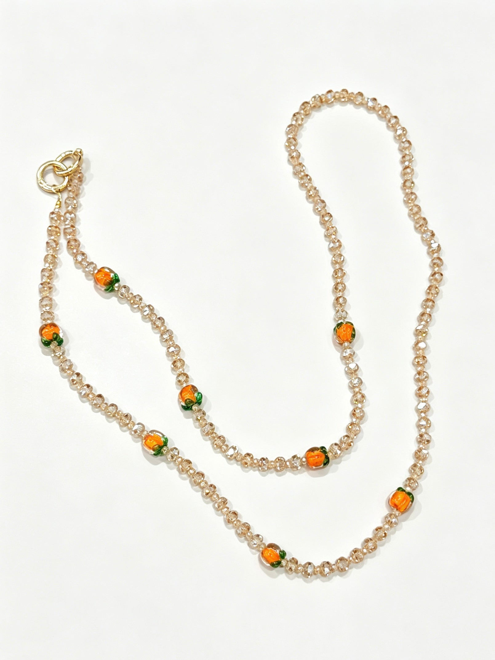 Champagne crystal phone lanyard with citrus