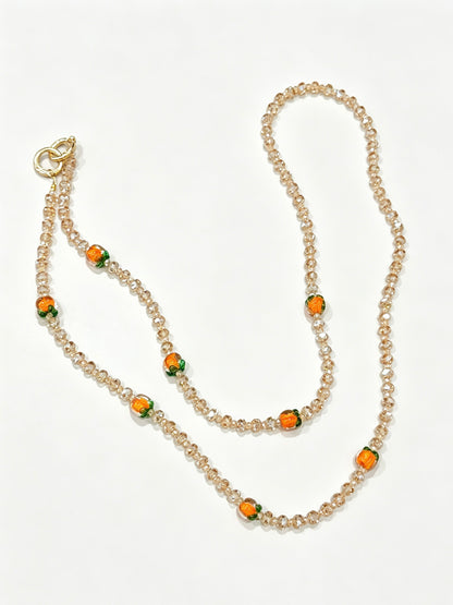Champagne crystal phone lanyard with citrus