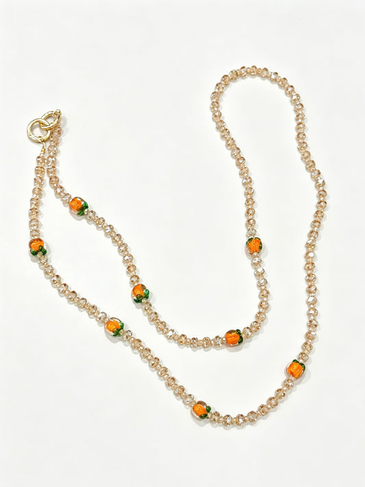 Champagne crystal phone lanyard with citrus